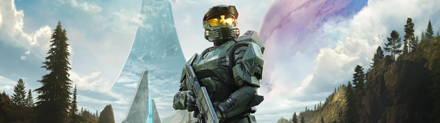 Master Chief standing beneath the Halo ring with his complete helmet visible